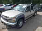 2006 Chevrolet Colorado 3LT z VIN 1GCDT136268247304, wystawiony jako IAAI lot #43112463 z przebiegiem 298 580 mil mil oraz . Historia ofert i sprzedaży dostępna na DreamBid. Obrazek 2.