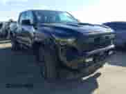 2024 Toyota Tacoma SR5 with VIN 3TMKB5FN3RM000779, listed as a IAAI auction lot 43081279 with 24,906 mi miles and . Bid and sale history available at DreamBid. Image 1.