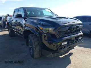 2024 Toyota Tacoma SR5 with VIN 3TMKB5FN3RM000779, listed as a IAAI auction lot 43081279 with 24,906 mi miles and . Bid and sale history available at DreamBid. Image 1.