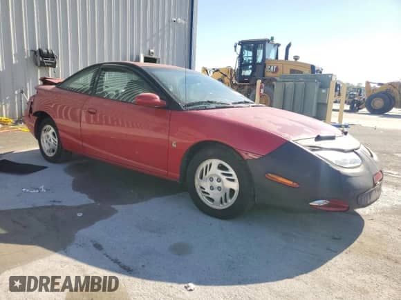2001 Saturn SC с VIN 1G8ZY12711Z207035, выставлен на аукционе Copart как лот 48784935 с пробегом 162 397 миль миль и Списание • Salvage title. История ставок и продаж доступна на DreamBid. Изображение 4.