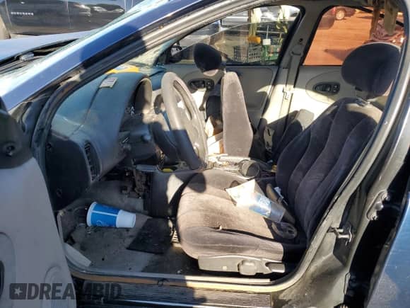1999 Saturn SL with VIN 1G8ZJ5272XZ141986, listed as a Copart auction lot 71496674 with Not provided miles and Salvage title. Bid and sale history available at DreamBid. Image 7.