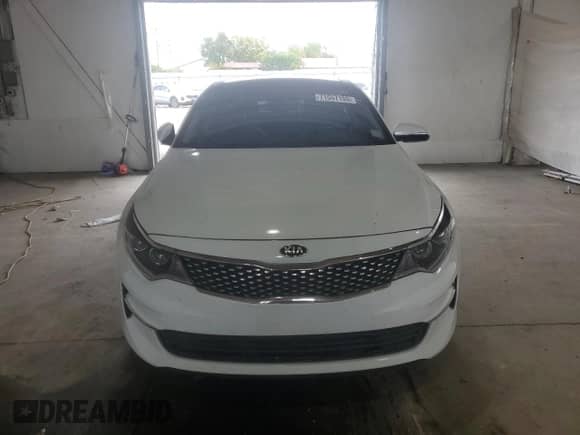 2016 Kia Optima EX with VIN 5XXGU4L34GG032331, listed as a Copart auction lot 71557155 with 127,419 mi miles and Salvage title. Bid and sale history available at DreamBid. Image 5.