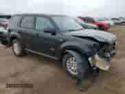 2008 Mercury Mariner Premier with VIN 4M2CU97188KJ32728, listed as a Copart auction lot 70736905 with 217,659 mi miles and Salvage title. Bid and sale history available at DreamBid. Image 4.