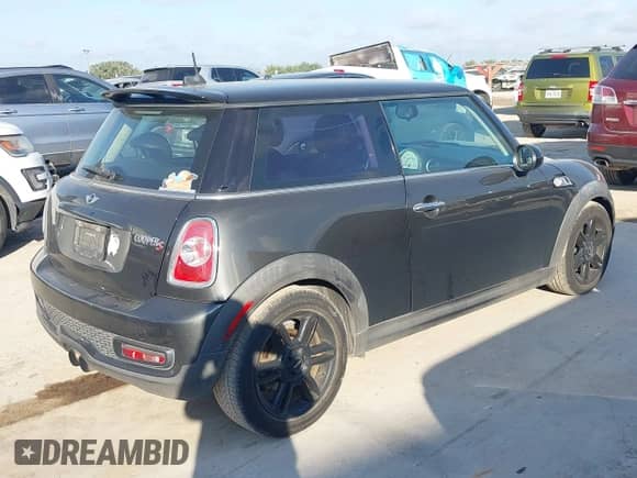 2013 MINI Hardtop S with VIN WMWSV3C54DT393473, listed as a IAAI auction lot 42925892 with 164,418 mi miles and . Bid and sale history available at DreamBid. Image 4.