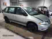 2000 Dodge Caravan SE with VIN 2B4GP45G7YR822770, listed as a Copart auction lot 86096444 with 128,592 mi miles and Salvage title. Bid and sale history available at DreamBid. Image 4.