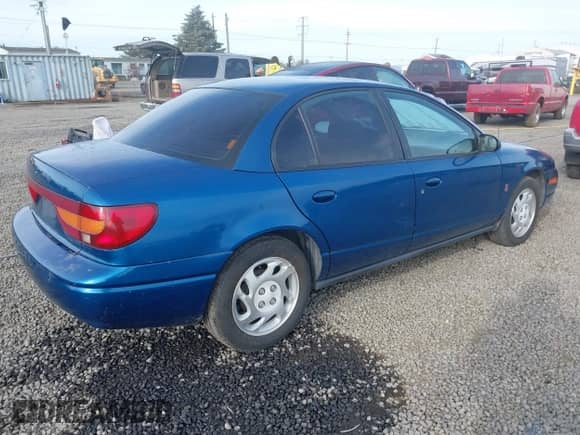 2000 Saturn SL with VIN 1G8ZK5275YZ143259, listed as a IAAI auction lot 43366243 with 121,018 mi miles and . Bid and sale history available at DreamBid. Image 4.