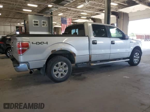 2013 Ford F-150 Lariat with VIN 1FTFW1ETXDKE18948, listed as a Copart auction lot 70455185 with 205,335 mi miles and Salvage title. Bid and sale history available at DreamBid. Image 3.