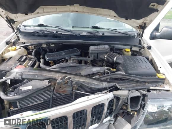 2002 Jeep Grand Cherokee Sport with VIN 1J4GW38S92C253513, listed as a IAAI auction lot 42470173 with 162,682 mi miles and . Bid and sale history available at DreamBid. Image 10.