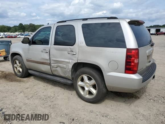 2007 Chevrolet Tahoe LTZ с VIN 1GNFK13087R217248, выставлен на аукционе Copart как лот 70634545 с пробегом 213 906 миль миль и Списание • Salvage title. История ставок и продаж доступна на DreamBid. Изображение 2.