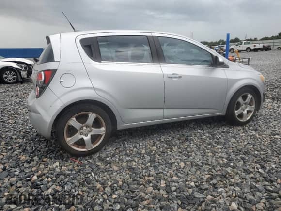 2012 Chevrolet Sonic LTZ с VIN 1G1JE6SH7C4123988, выставлен на аукционе Copart как лот 64845065 с пробегом 130 139 миль миль и Списание • Salvage title. История ставок и продаж доступна на DreamBid. Изображение 3.