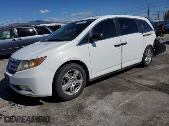 2012 Honda Odyssey LX с VIN 5FNRL5H27CB049204, выставлен на аукционе Copart как лот 86153415 с пробегом 213 175 миль миль и Списание • Salvage title. История ставок и продаж доступна на DreamBid. Изображение 1.