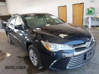 2016 Toyota Camry LE z VIN 4T1BD1FKXGU180288, wystawiony jako IAAI lot #42731890 z przebiegiem 118 482 mil mil oraz . Historia ofert i sprzedaży dostępna na DreamBid. Obrazek 1.