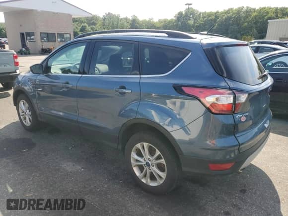 2018 Ford Escape SE with VIN 1FMCU9GD4JUB33011, listed as a Copart auction lot 67183685 with 43,428 mi miles and Salvage title. Bid and sale history available at DreamBid. Image 2.