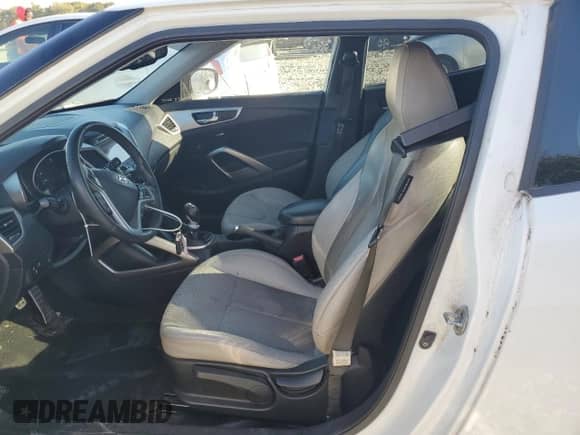 2012 Hyundai Veloster w/Gray Int z VIN KMHTC6AD3CU021197, wystawiony jako Copart lot #84803605 z przebiegiem 170 338 mil mil oraz Szkoda całkowita • Salvage title. Historia ofert i sprzedaży dostępna na DreamBid. Obrazek 8.