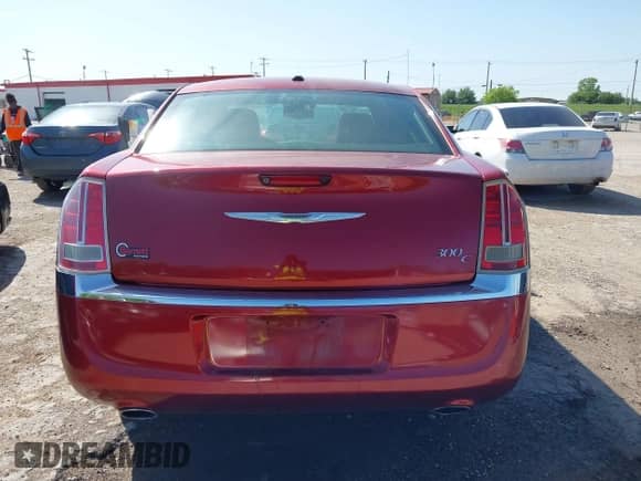 2014 Chrysler 300 C with VIN 2C3CCAEG5EH372859, listed as a IAAI auction lot 42004993 with 204,587 mi miles and . Bid and sale history available at DreamBid. Image 16.
