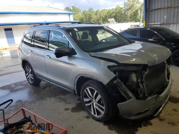 2017 Honda Pilot Touring with VIN 5FNYF5H91HB020627, listed as a Copart auction lot 72072435 with 137,363 mi miles and Salvage title. Bid and sale history available at DreamBid. Image 4.