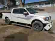 2012 Ford F-150 Lariat with VIN 1FTFW1E68CFB85590, listed as a Copart auction lot 58897445 with 131,901 mi miles and Salvage title. Bid and sale history available at DreamBid. Image 4.