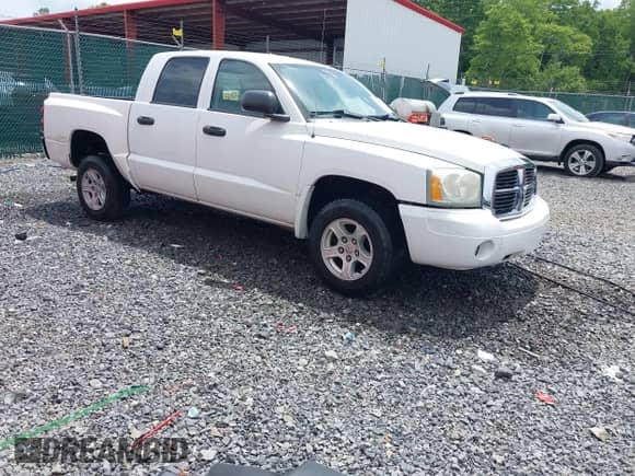 2006 Dodge Dakota SLT z VIN 1D7HW48N66S524247, wystawiony jako IAAI lot #42442778 z przebiegiem 71 419 mil mil oraz . Historia ofert i sprzedaży dostępna na DreamBid. Obrazek 1.