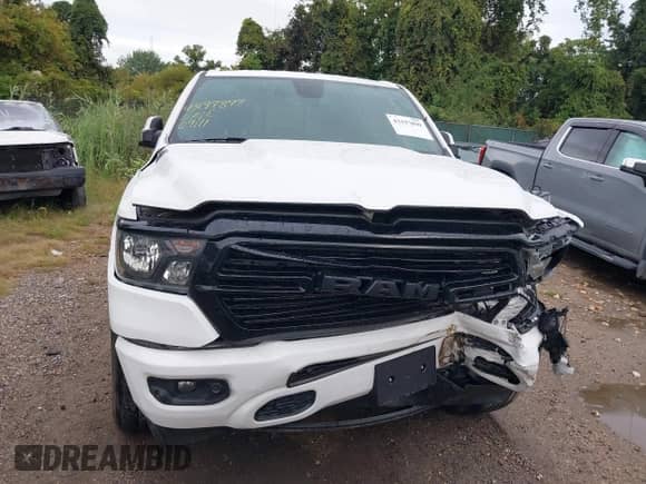 2020 Ram 1500 Lone Star with VIN 1C6SRFFT8LN299903, listed as a IAAI auction lot 43197899 with 50,350 mi miles and . Bid and sale history available at DreamBid. Image 12.