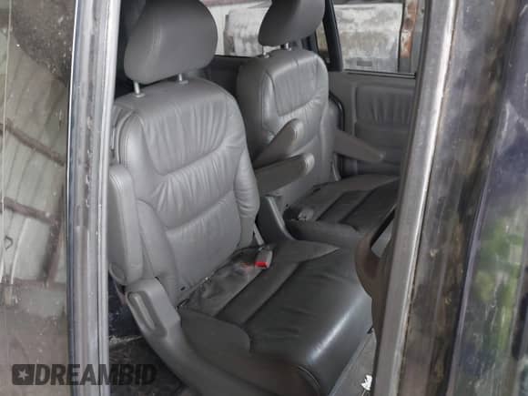 2008 Honda Odyssey EX-L with VIN 5FNRL38678B085411, listed as a IAAI auction lot 43015457 with 206,565 mi miles and . Bid and sale history available at DreamBid. Image 8.
