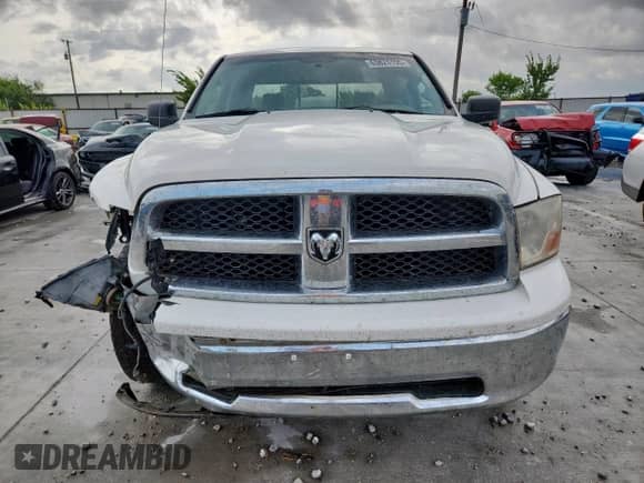 2009 Dodge 1500 SLT z VIN 1D3HV18P79S804185, wystawiony jako Copart lot #63824195 z przebiegiem 206 016 mil mil oraz Szkoda całkowita • Salvage title. Historia ofert i sprzedaży dostępna na DreamBid. Obrazek 5.