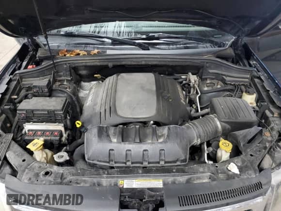 2012 Jeep Grand Cherokee Limited z VIN 1C4RJFBT1CC281632, wystawiony jako Copart lot #85119285 z przebiegiem 243 532 mil mil oraz Czysty tytuł • Clean title. Historia ofert i sprzedaży dostępna na DreamBid. Obrazek 12.