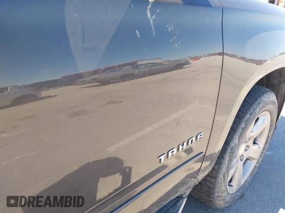 2018 Chevrolet Tahoe Premier z VIN 1GNSKCKC2JR315267, wystawiony jako IAAI lot #42330815 z przebiegiem 108 399 mil mil oraz . Historia ofert i sprzedaży dostępna na DreamBid. Obrazek 6.