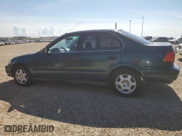 1998 Honda Civic z VIN 2HGEJ6682WH905378, wystawiony jako Copart lot #67458325 z przebiegiem 200 442 mil mil oraz Szkoda całkowita • Salvage title. Historia ofert i sprzedaży dostępna na DreamBid. Obrazek 2.