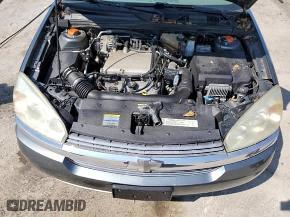 2004 Chevrolet Malibu LS z VIN 1G1ZT548X4F151449, wystawiony jako Copart lot #71453944 z przebiegiem 162 166 mil mil oraz Nie do naprawy • Non repairable. Historia ofert i sprzedaży dostępna na DreamBid. Obrazek 11.