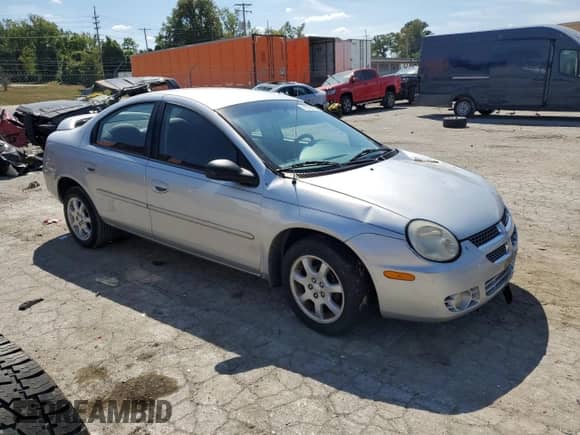2005 Dodge Neon SXT with VIN 1B3ES56C55D195402, listed as a Copart auction lot 71735184 with 172,160 mi miles and Salvage title. Bid and sale history available at DreamBid. Image 4.