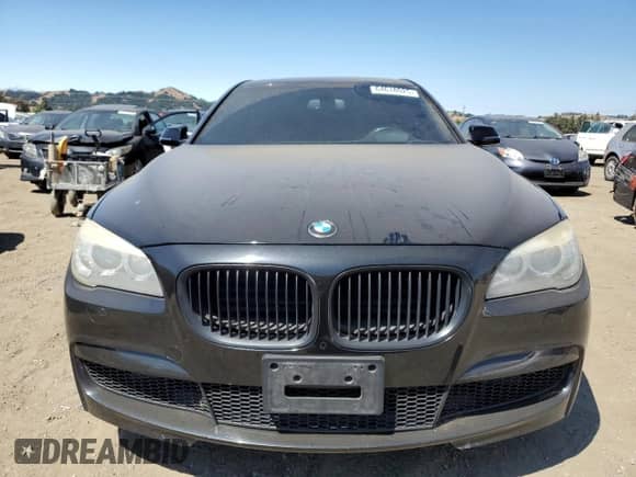 2013 BMW 7 Series 750i с VIN WBAYA8C59DD227527, выставлен на аукционе Copart как лот 64618025 с пробегом 96 049 миль миль и Списание • Salvage title. История ставок и продаж доступна на DreamBid. Изображение 5.