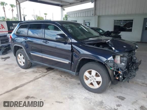 2011 Jeep Grand Cherokee Laredo with VIN 1J4RS4GG7BC515567, listed as a IAAI auction lot 43176668 with 147,454 mi miles and . Bid and sale history available at DreamBid. Image 1.