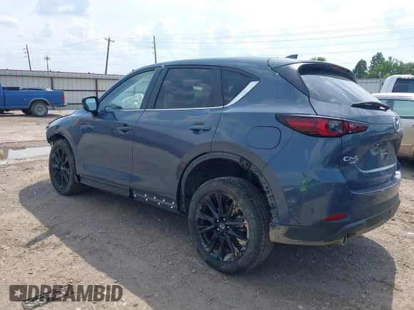 2025 Mazda CX-5 S Carbon Edition z VIN JM3KFBCM4S0679413, wystawiony jako IAAI lot #43019149 z przebiegiem 4 561 mil mil oraz . Historia ofert i sprzedaży dostępna na DreamBid. Obrazek 3.