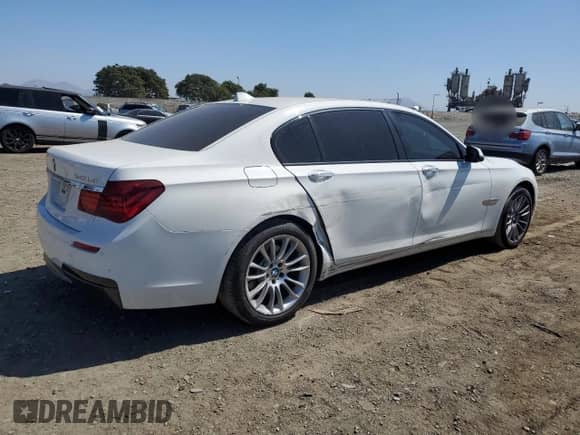 2015 BMW 7 Series with VIN WBAYG6C59FD383685, listed as a Copart auction lot 72630224 with 157,780 mi miles and Salvage title. Bid and sale history available at DreamBid. Image 3.