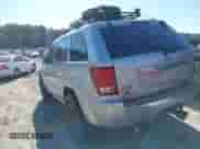 2009 Jeep Grand Cherokee with VIN 1J8HR68T39C540795, listed as a IAAI auction lot 41379112 with 236,624 mi miles and . Bid and sale history available at DreamBid. Image 3.