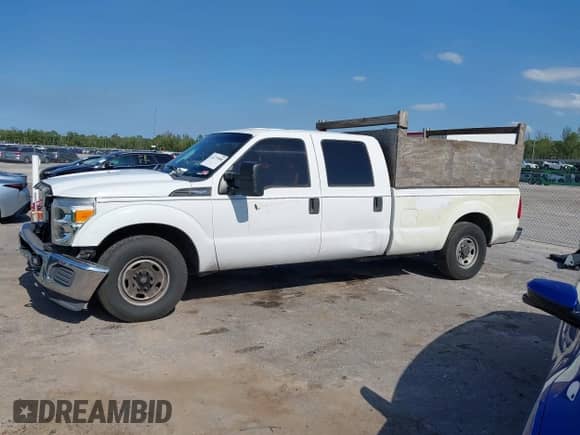 2014 Ford F-250 XL with VIN 1FT7W2A60EEA43758, listed as a IAAI auction lot 42275088 with 248,819 mi miles and . Bid and sale history available at DreamBid. Image 14.