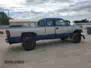 1996 Dodge 1500 с VIN 3B7HF13Z1TG194894, выставлен на аукционе Copart как лот 62724645 с пробегом 219 882 миль миль и Списание • Salvage title. История ставок и продаж доступна на DreamBid. Изображение 3.