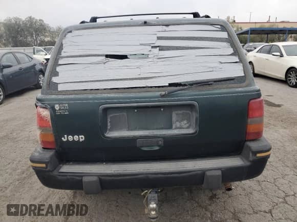 1993 Jeep Grand Cherokee Laredo with VIN 1J4GZ58S7PC125040, listed as a Copart auction lot 78846954 with 149,531 mi miles and Salvage title. Bid and sale history available at DreamBid. Image 6.