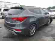 2018 Hyundai Santa Fe 2.0T with VIN 5XYZU4LA1JG529573, listed as a IAAI auction lot 43307903 with 83,585 mi miles and . Bid and sale history available at DreamBid. Image 4.
