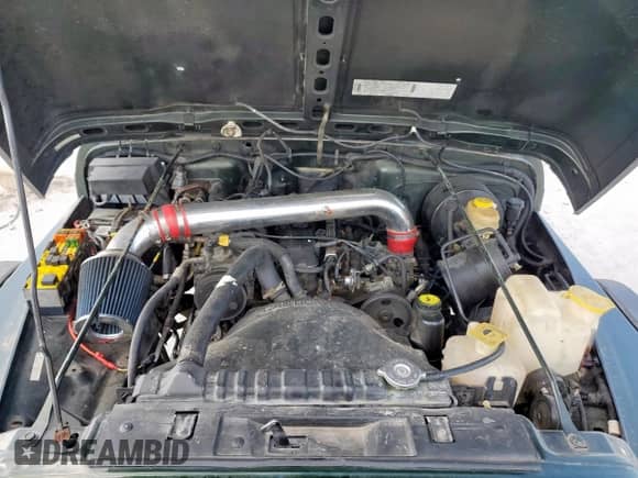 1997 Jeep Wrangler SE z VIN 1J4FY29P8VP471563, wystawiony jako Copart lot #64305655 z przebiegiem Nie podano mil oraz Szkoda całkowita • Salvage title. Historia ofert i sprzedaży dostępna na DreamBid. Obrazek 11.