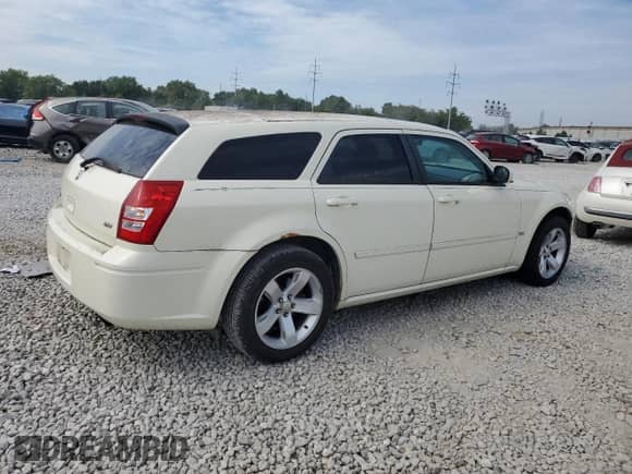 2006 Dodge Magnum SXT with VIN 2D4GZ47V16H149067, listed as a Copart auction lot 67564774 with 238,207 mi miles and Salvage title. Bid and sale history available at DreamBid. Image 3.