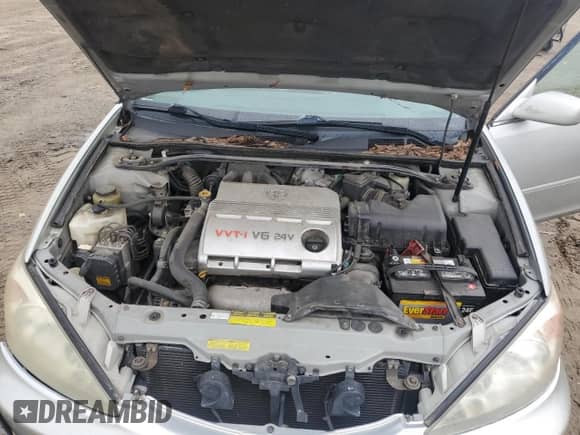 2004 Toyota Camry XLE с VIN 4T1BF30K54U571522, выставлен на аукционе Copart как лот 81809265 с пробегом 179 334 миль миль и Списание • Salvage title. История ставок и продаж доступна на DreamBid. Изображение 11.