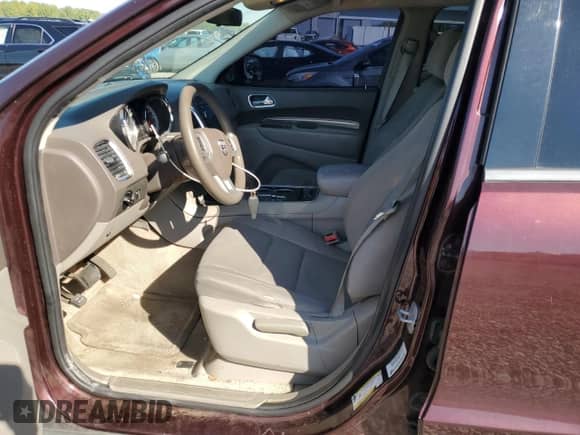 2012 Dodge Durango SXT with VIN 1C4RDJAG3CC147235, listed as a Copart auction lot 84365645 with 242,191 mi miles and Salvage title. Bid and sale history available at DreamBid. Image 7.