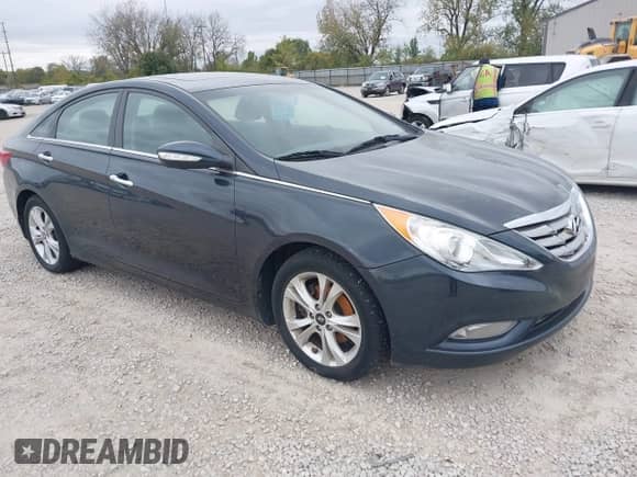 2013 Hyundai Sonata SE with VIN 5NPEC4AC5DH643465, listed as a IAAI auction lot 43523397 with 165,379 mi miles and . Bid and sale history available at DreamBid. Image 1.