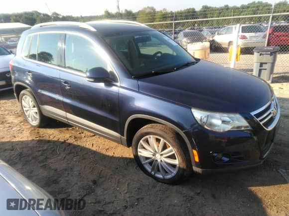 2011 Volkswagen Tiguan SE with VIN WVGAV7AX5BW512469, listed as a IAAI auction lot 42673142 with 165,159 mi miles and . Bid and sale history available at DreamBid. Image 1.