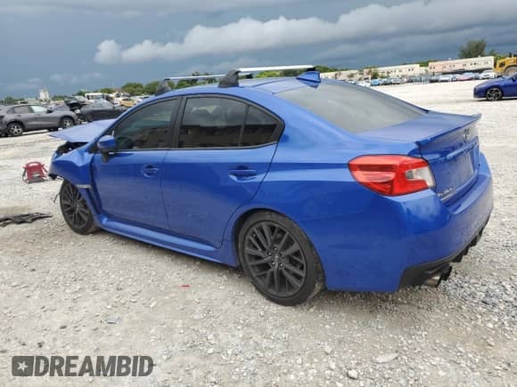 2021 Subaru WRX with VIN JF1VA1A6XM9818547, listed as a Copart auction lot 64762565 with 63,996 mi miles and Salvage title. Bid and sale history available at DreamBid. Image 2.