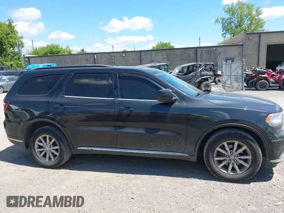2014 Dodge Durango SXT with VIN 1C4RDJAG7EC561962, listed as a IAAI auction lot 42771485 with 179,140 mi miles and . Bid and sale history available at DreamBid. Image 13.