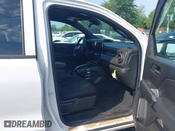 2023 Chevrolet Colorado 2WD Work Truck с VIN 1GCPSBEK7P1156474, выставлен на аукционе IAAI как лот 42871378 с пробегом 22 835 миль миль и . История ставок и продаж доступна на DreamBid. Изображение 5.