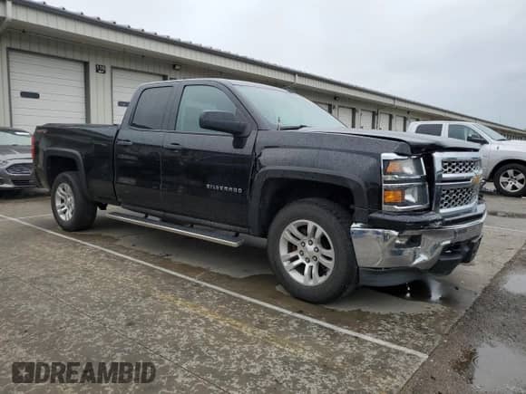 2014 Chevrolet Silverado 1500 LT with VIN 1GCVKREH2EZ411650, listed as a Copart auction lot 54817925 with 142,987 mi miles and Salvage title. Bid and sale history available at DreamBid. Image 4.