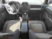 2014 Jeep Compass Sport z VIN 1C4NJCBB3ED679460, wystawiony jako Copart lot #87197415 z przebiegiem 117 309 mil mil oraz Szkoda całkowita • Salvage title. Historia ofert i sprzedaży dostępna na DreamBid. Obrazek 8.